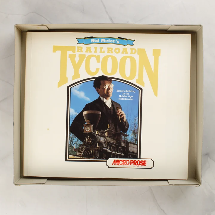 A Sid Meier's Railroad Tycoon játék illusztrált kézikönyve a dobozban
