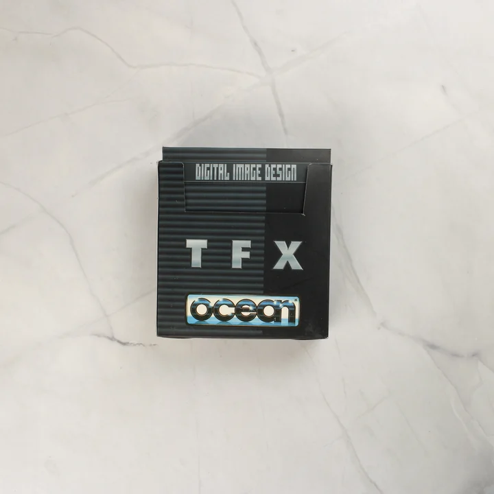 TFX belső doboz A TFX videójáték belső fekete tartódoboza felülről fotózva