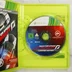 A nyitott Xbox 360 tok a Need for Speed Hot Pursuit Limited Edition játéklemezzel és a kézikönyv szélével
