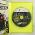 A nyitott Xbox 360 tok a Need for Speed ProStreet lemezzel és a kézikönyv szélével