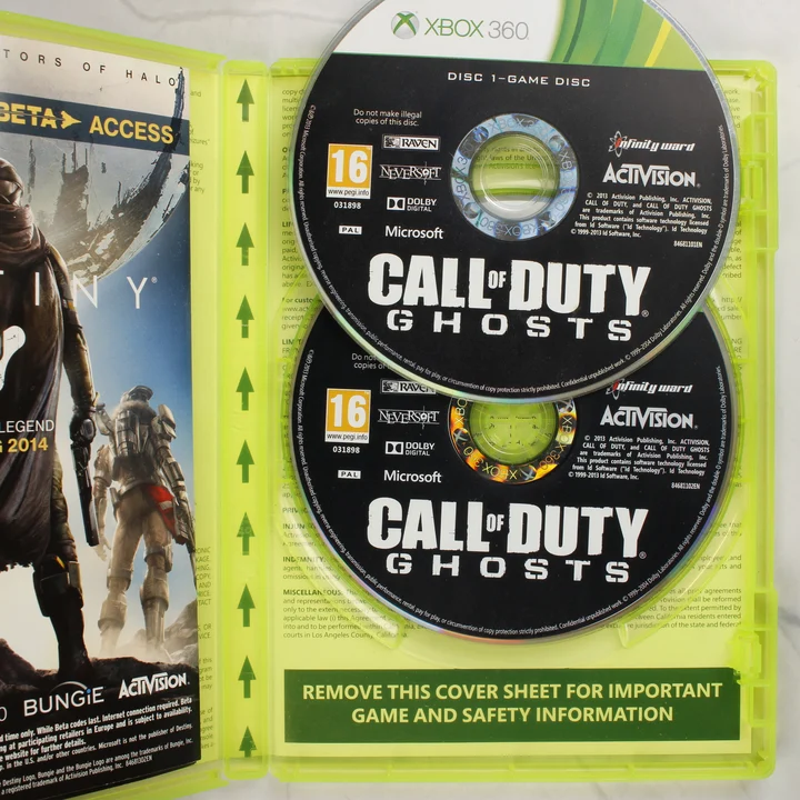 A Call of Duty: Ghosts Xbox 360 nyitott tokja a két játéklemezzel