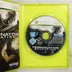 A nyitott Xbox 360 tok a Terminator Salvation játéklemezzel és a kiskönyvvel