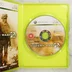 Nyitott Xbox 360 tok a Call of Duty: Modern Warfare 2 lemezzel és kiskönyvvel