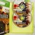 A nyitott Xbox 360 tok a két játéklemezzel és a kiskönyvvel