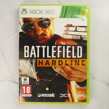 A Battlefield Hardline Xbox 360 játék előlapja a zöld műanyag tokban