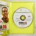 A nyitott Xbox 360 tok a FIFA 06 játéklemezzel