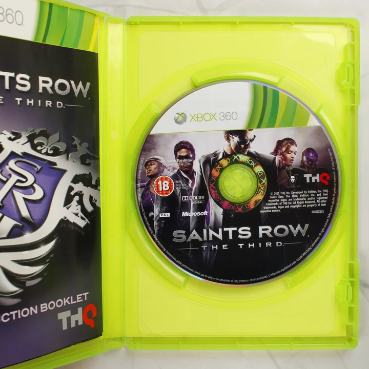 Saints Row: The Third Xbox 360 belső Saints Row: The Third Xbox 360 nyitott tok a lemezzel és a füzettel