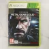 A Metal Gear Solid V: Ground Zeroes Xbox 360 játék előlapi borítója a zöld tokban