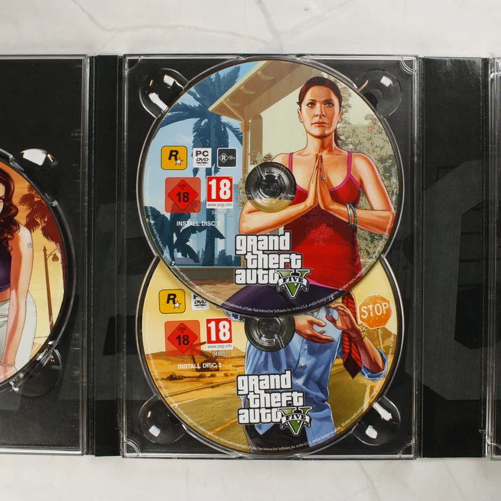 Grand Theft Auto V 2-es és 3-as lemez A Grand Theft Auto V PC-s változatának 2. és 3. számú telepítő DVD lemezei a tokban
