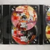 A Grand Theft Auto V PC-s változatának 4. és 5. számú telepítő DVD lemezei a tokban