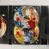 A Grand Theft Auto V PC-s változatának 2. és 3. számú telepítő DVD lemezei a tokban