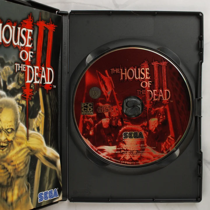 The House of the Dead III PC játék belső The House of the Dead III PC videójáték nyitott tokja a CD-ROM lemezzel