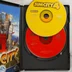 A SimCity 4 játék nyitott tokja a piros és sárga CD-ROM lemezekkel, valamint a kézikönyvvel