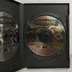 A Lionheart: Legacy of the Crusader játék két CD-lemeze a nyitott tokban