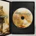 A nyitott tok a Call of Duty: Modern Warfare 2 DVD lemezzel és a kiskönyvvel