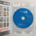 A SimCity 3000 UK Edition nyitott tokja a CD-ROM lemezzel és a füzettel