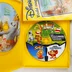 A nyitott sárga tok a két CD-ROM lemezzel és a kézikönyvvel