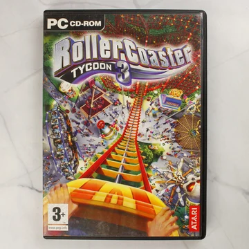 A RollerCoaster Tycoon 3 PC-s videójáték tokjának előlapja a színes borítóval