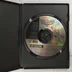 A Les aventures de Buzz L'Éclair eredeti CD-ROM lemeze a nyitott tokban