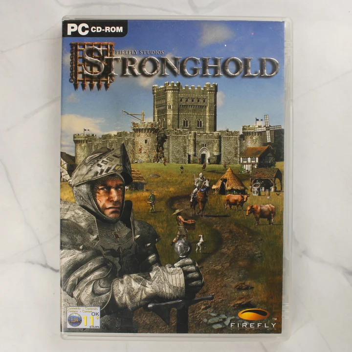 A Stronghold PC-s videójáték előlapi borítója a műanyag tokban
