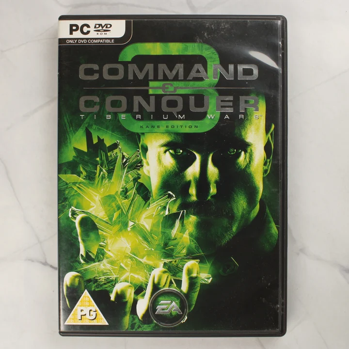 Command & Conquer 3 Tiberium Wars Kane Edition előlap A Command & Conquer 3 Tiberium Wars Kane Edition PC játék előlapja zöld tónusú grafikával
