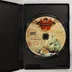 Az Age of Pirates: Caribbean Tales PC játék DVD-ROM lemeze a nyitott tokban