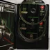 A nyitott tok a két CD-ROM lemezzel és a kézikönyvvel