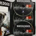 A Watch Dogs Special Edition PC tokjának belseje a három DVD lemezzel és a kóddal