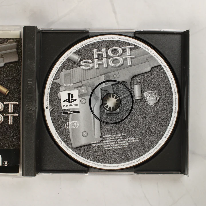Hot Shot PS1 játéklemez A Hot Shot PlayStation játéklemez a nyitott tokban