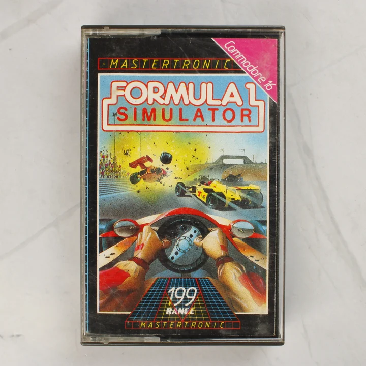 A Formula 1 Simulator Commodore 16 játék tokja elölről, színes borítóval