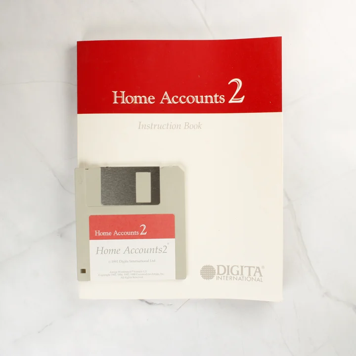 Home Accounts 2 használati útmutató és 3,5 colos floppy lemez
