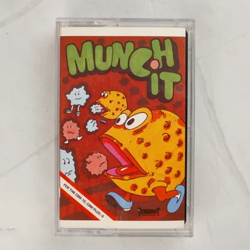 Munch-It videójáték kazetta tokban, elölnézetből
