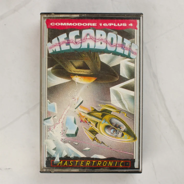 A Megabolts videójáték előlapja műanyag tokban, Commodore 16 és Plus 4 platformra