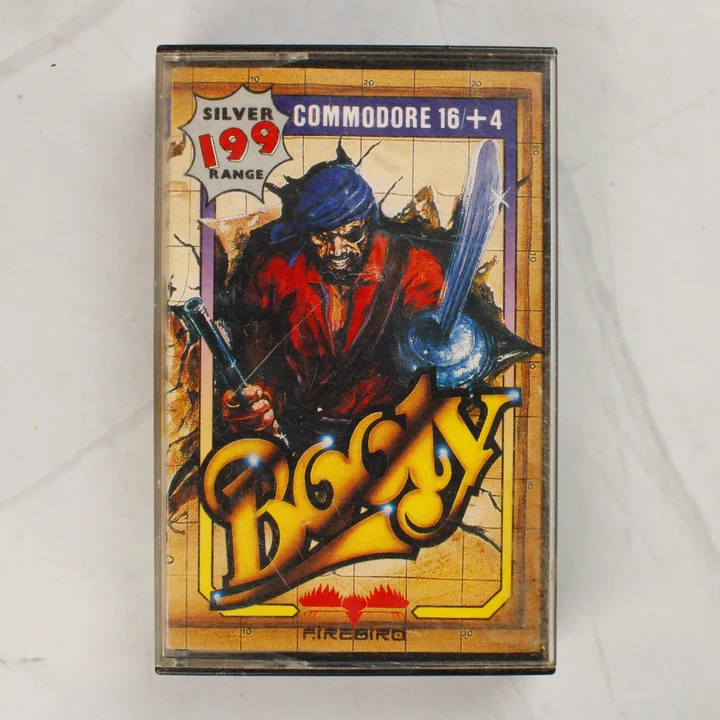 Booty Commodore 16 játék tokban A Booty című Commodore 16 videójáték tokban, elölnézetből