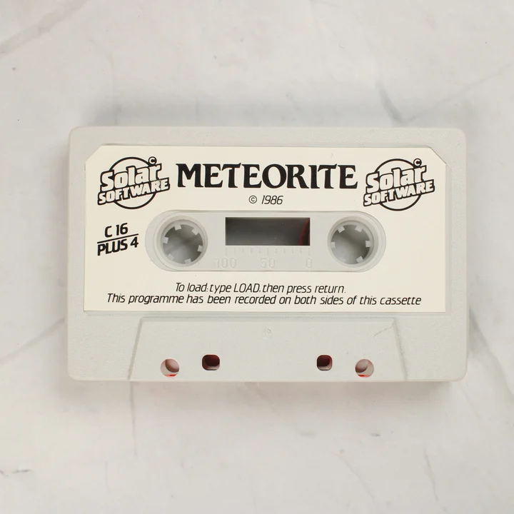 A Meteorite játékot tartalmazó szürke magnókazetta