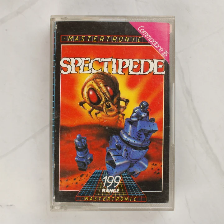 Spectipede Commodore 16 játék tokban A Spectipede Commodore 16 játék kazettája az eredeti illusztrált tokban