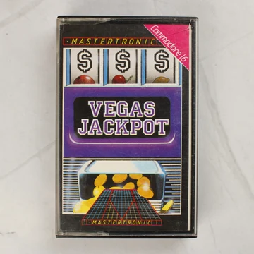 A Vegas Jackpot Commodore 16 játék tokja elölről, színes papírborítóval