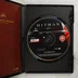 Nyitott tok a Hitman: Blood Money lemezzel és kézikönyvvel