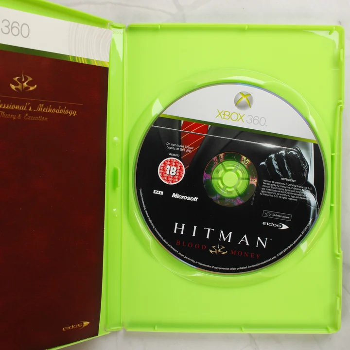 Nyitott Hitman: Blood Money Xbox 360 tok a lemezzel és a kézikönyvvel
