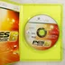 Kinyitott zöld Xbox 360 tok a PES 6 játéklemezzel és kiskönyvvel