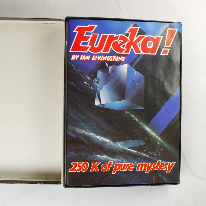 Eureka! nyitott doboz és füzet Nyitott Eureka! doboz a benne lévő füzettel