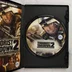 Nyitott DVD-tok a Terrorist Takedown 2 lemezzel és a használati kézikönyvvel