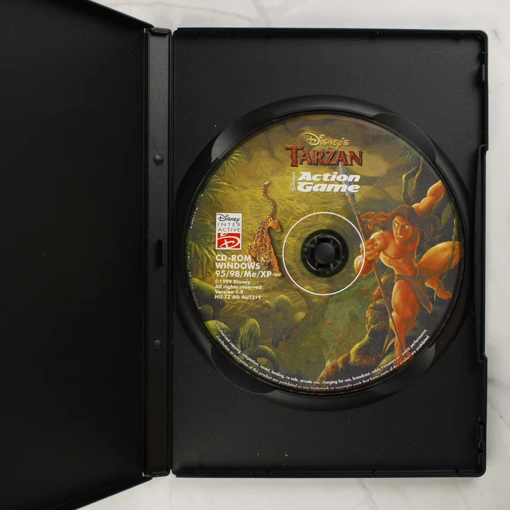 Nyitott tok a Disney Tarzan PC CD-ROM lemezzel