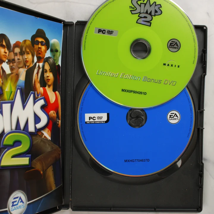 The Sims 2 PC játéklemez és bónusz DVD a fekete tokban