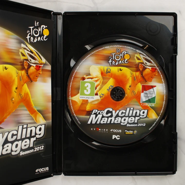 Pro Cycling Manager Season 2012 nyitott tok lemezzel és kézikönyvvel Nyitott PC tok a Pro Cycling Manager Season 2012 DVD lemezzel és a füzettel