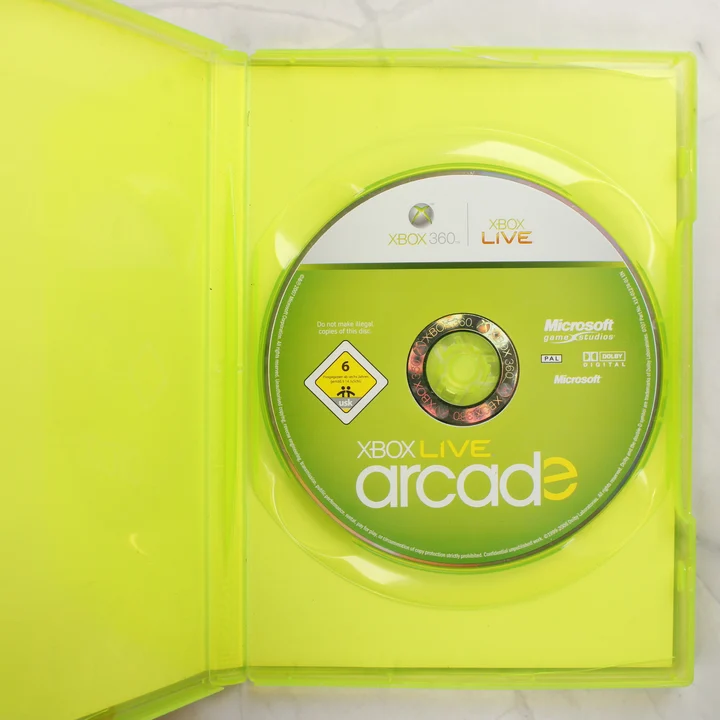 Xbox Live Arcade Compilation Disc nyitott tok és lemez Nyitott műanyag tok benne az Xbox Live Arcade lemezzel