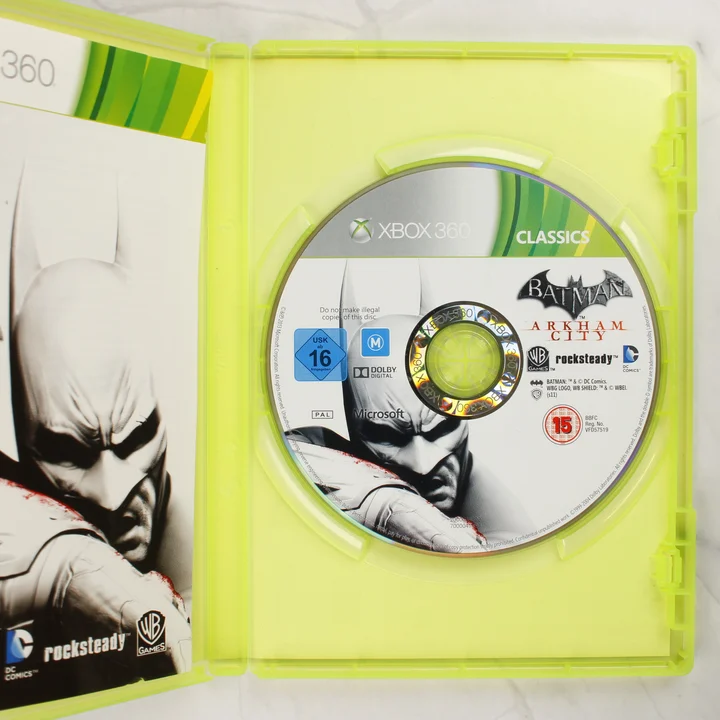 Batman: Arkham City Xbox 360 Classics nyitott tok lemezzel Nyitott Xbox 360 tok a Batman: Arkham City lemezzel és a kézikönyvvel