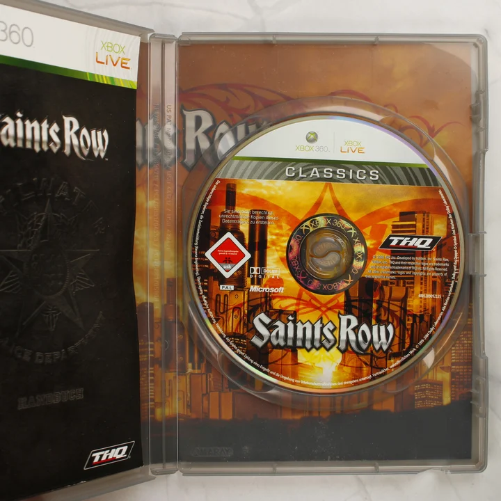 Saints Row Classics Xbox 360 disc and manual Saints Row Classics Xbox 360 lemez és füzet a nyitott tokban