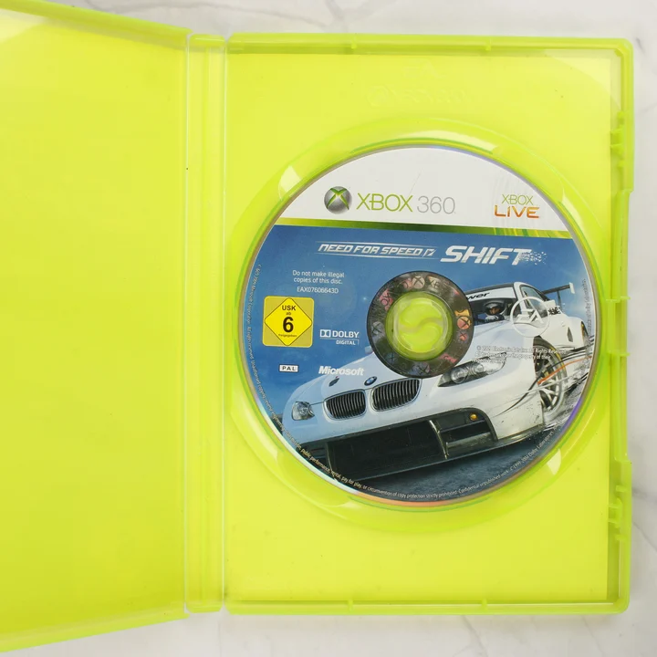 Need for Speed Shift Xbox 360 nyitott tok és lemez A Need for Speed Shift Xbox 360 játék nyitott tokja a lemezzel