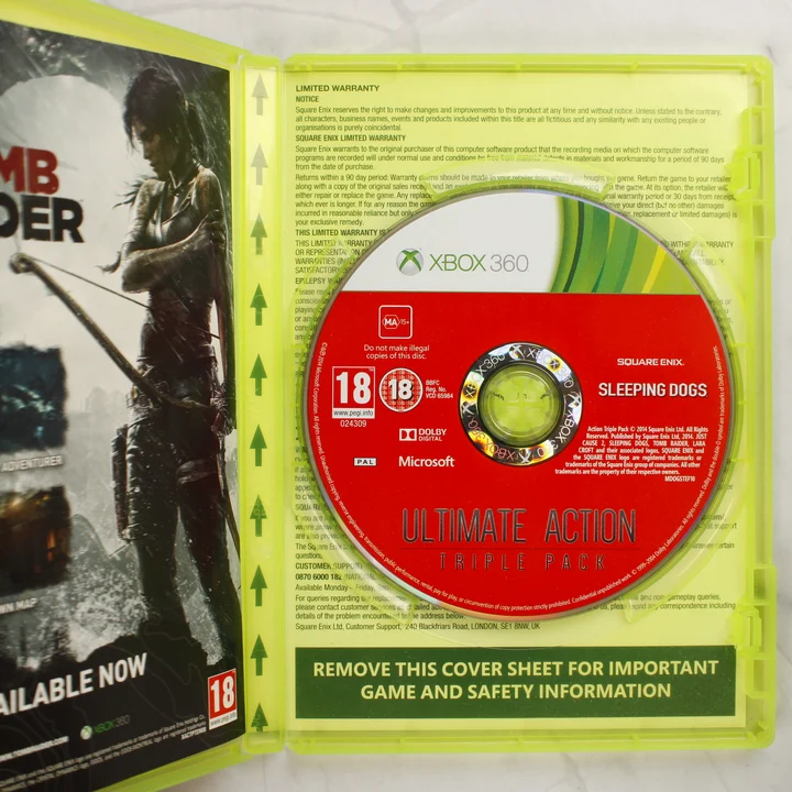 Nyitott Xbox 360 tok a lemezzel és a füzettel
